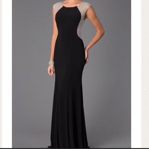 Xscape Beaded Illusion Back Black Gown.
